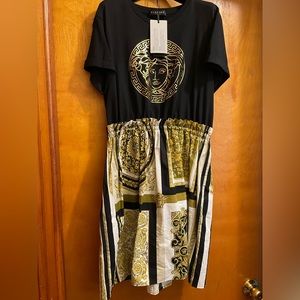 Girls Versace Dress. Size 14 . Only worn one time for an hour for a photo shoot.